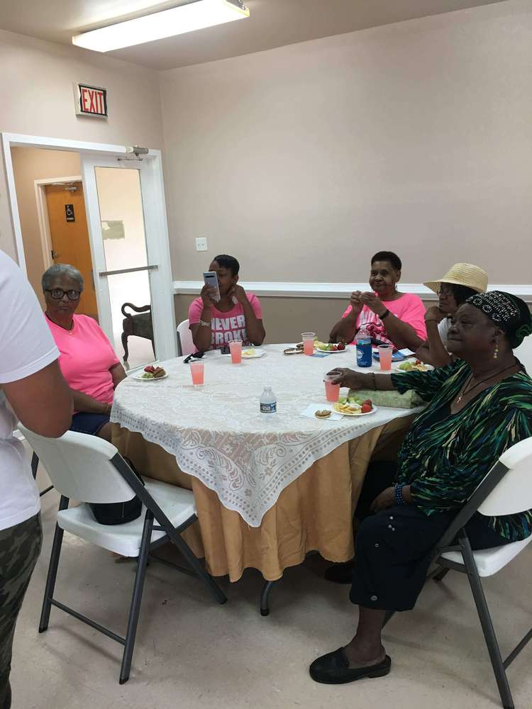 women attending breast cancer awareness event