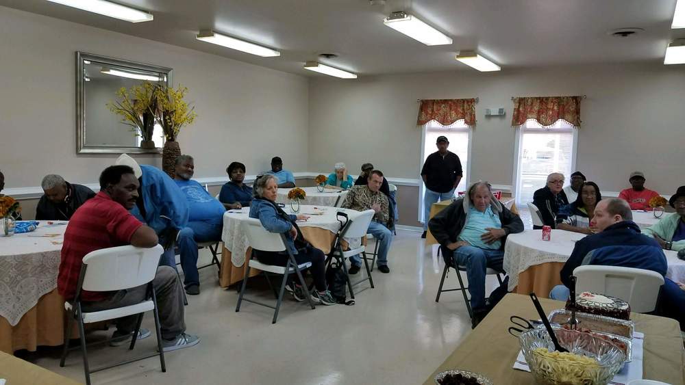 Residents at their tables