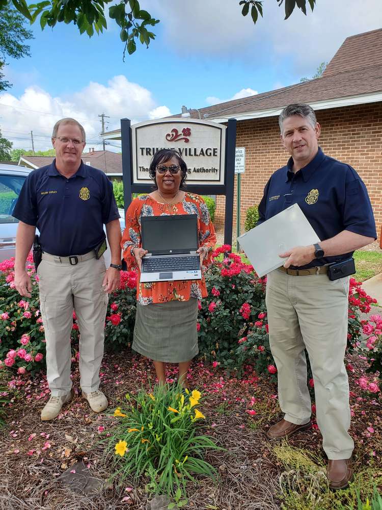 Major Sidney Corley, THA Executive Director Patricia Allen, Chief Mike Richardson