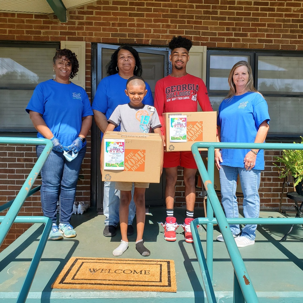 Kids receiving their boxes