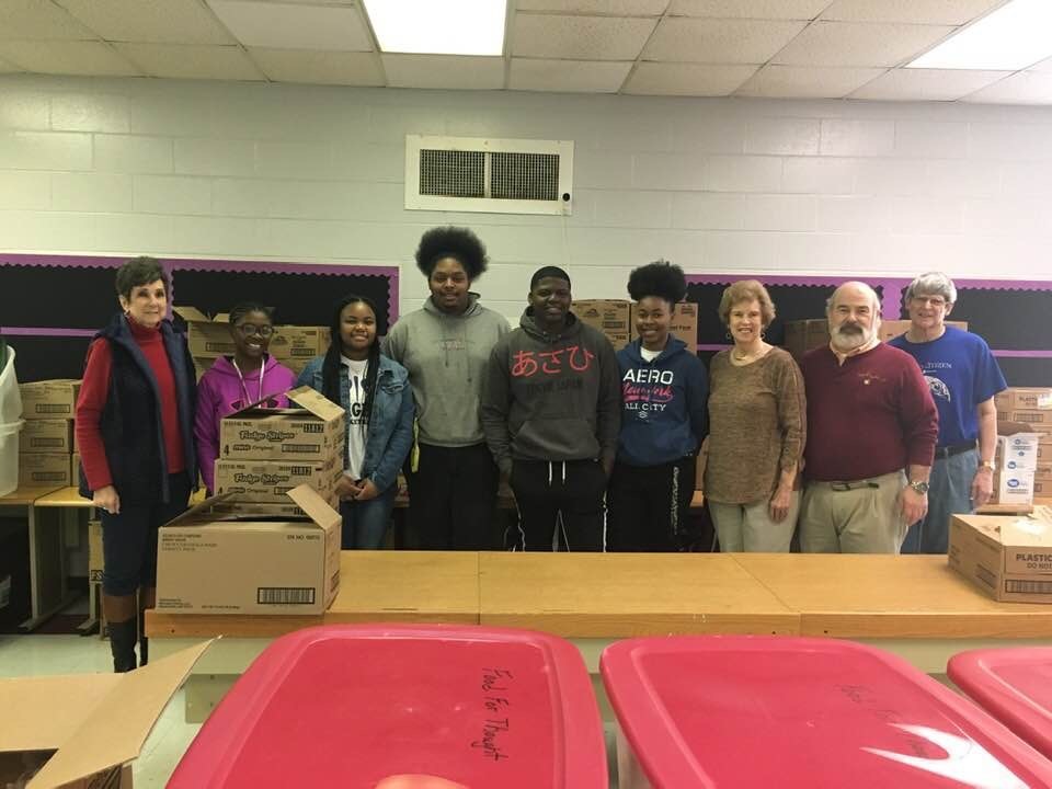 food bag packer volunteers group